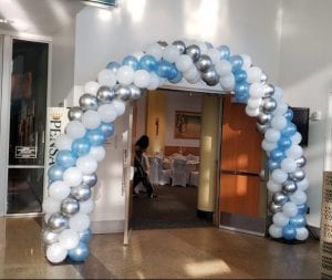 Balloon arch entrance for event in blue white silver