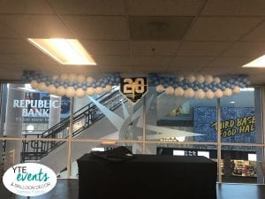 20th anniversary for Tampa Bay Rays with logo balloon garland over DJ table