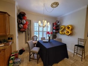 A great set of balloon decor around a table scaled