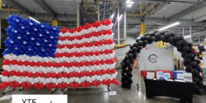 American flag balloon wall and black balloon archway made for a Memorial Day event.