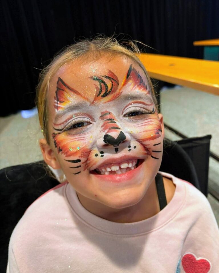 Animal Face Painting little girl kitten tiger or fox