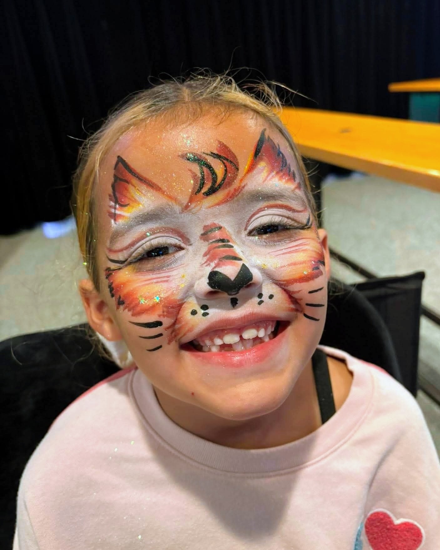 Animal Face Painting little girl kitten tiger or fox