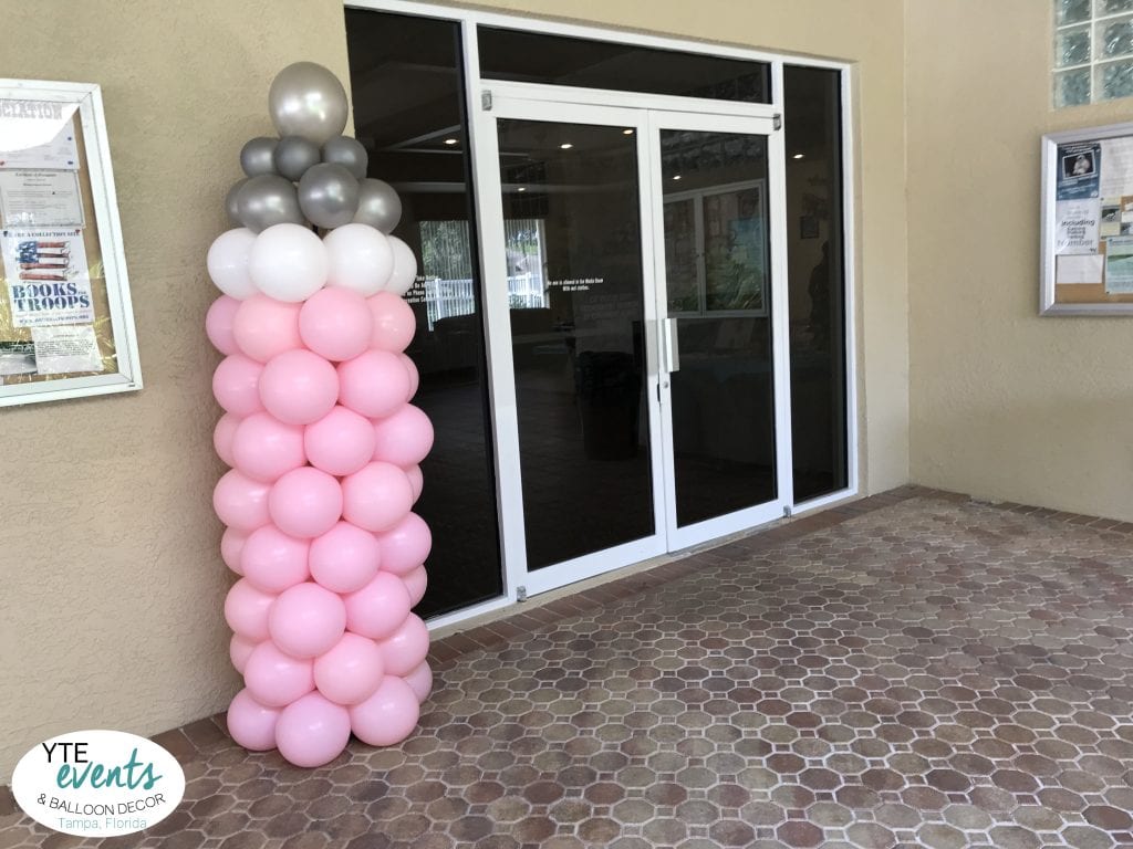 Baby shower bottle balloon column sculpture in pink for event