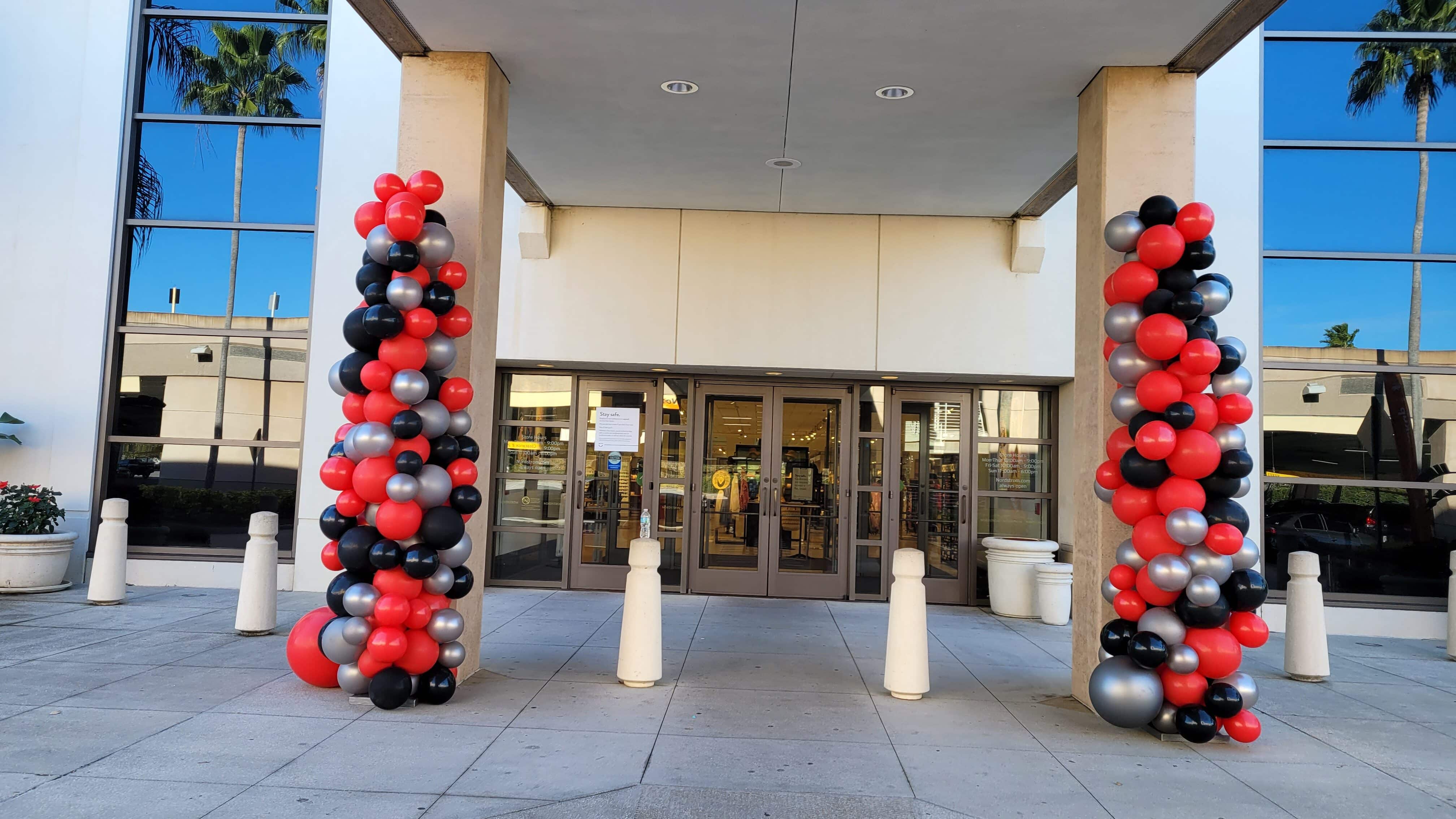Balloon Columns organic at Nordstroms entrance International mall decorations red black silver go bucs superbowl 2021 scaled