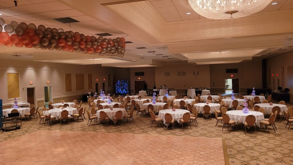 Balloon Drop with lighting and balloons for sweet sixteen event