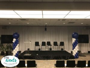 Blue Column Stage decorations for corporate event
