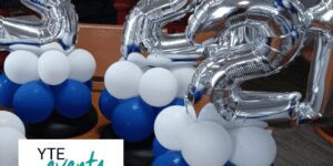 Blue and white balloon centerpieces with foil balloon toppers for Hudson FL Kostreles event