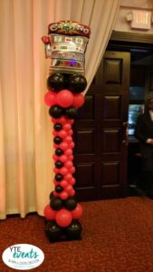 Casino themed balloon column
