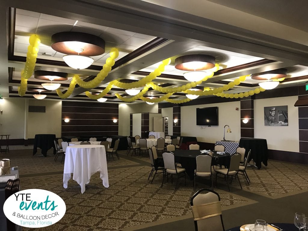 Ceiling balloon decorations for corporate event