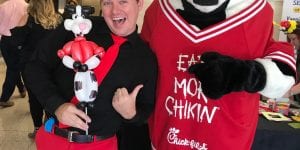 Chick fil a cow with Mr Fudge and Balloon caricature of mascot
