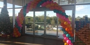 Colorful balloon arch for Top Golf Tampa Decor