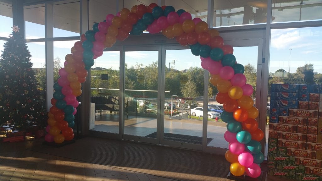 Colorful balloon arch for Top Golf Tampa Decor
