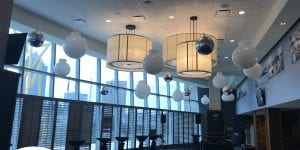 Elegant Ceiling balloon decorations for corporate event at Amalie Arena