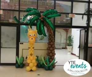 Giraffe and palm tree balloon sculptures at Indian Cultural Center Tampa Florida