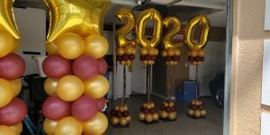 Graduating 2020 Burgundy and Gold Balloon Decorations Columns scaled