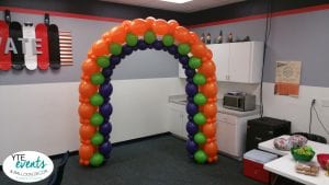 Halloween theme balloon arch orange and purple and lime