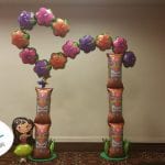 Hawaiian luau themed balloon arch organic foil design