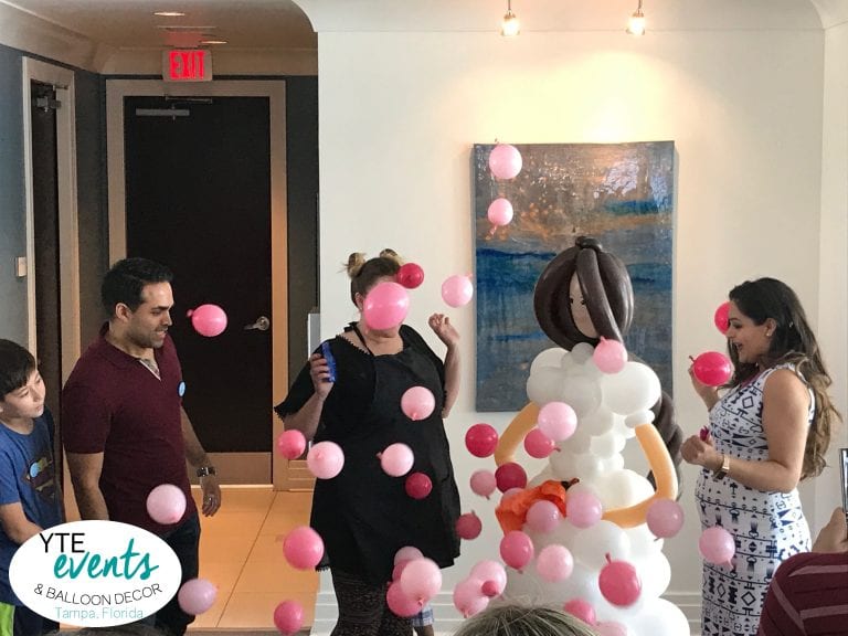 Gender Reveal with balloon mom sculpture