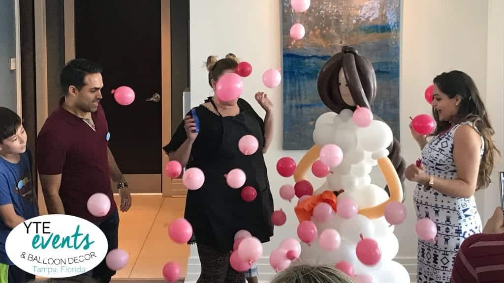 Hosting a gender reveal balloon for a lucky couple