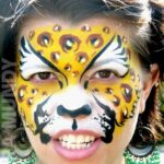cheetah face paint on child from event