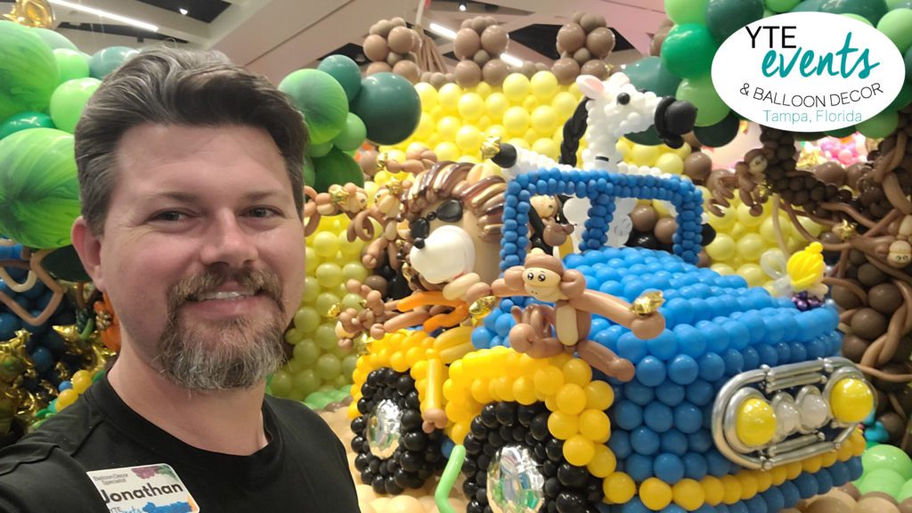 Jonathan Fudge from YTE Events and Balloon Decor in front of Jeep Sculpture from Balloon Wonderland Give Kids the World Village Fundraiser