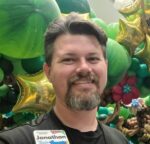Jonathan Fudge from YTE Events in front of Jungle Safari Entrance at GKTW Balloon Wonderland