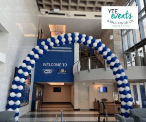 Large blue and white balloon arch at Amalie Arena in downtown Tampa.