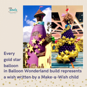 Make a wish gold star balloons around purple tower for give kids the world