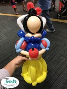 Master Balloon Artist Mr Fudge makes a princess snow white for tampa bay rays event