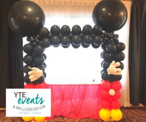 Mickey mouse balloon photo booth.