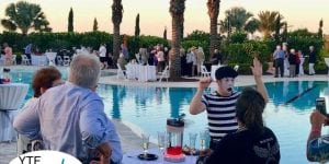 Mime making waves in Sarasota with corporate event by pool