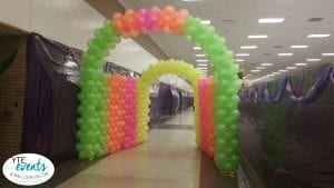 Neon Balloon Arch tunnel for high school prom