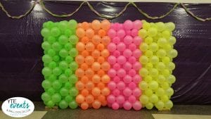 Neon balloon wall for homecoming dance photo backdrop