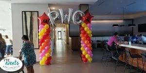 PWC balloon columns with stars silver red yellow pink and orange