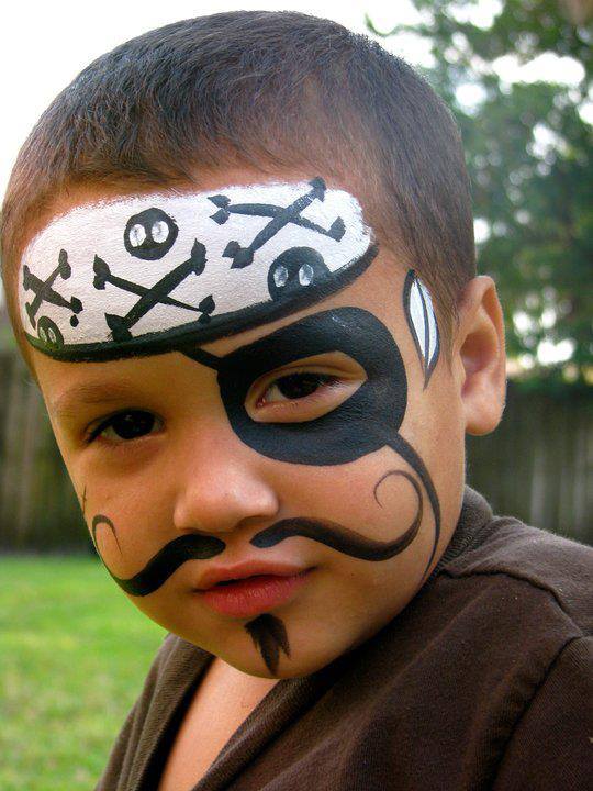 Pirate Face Painting face painting for parties with pirate eye patch and pirate skull cap painted on a face