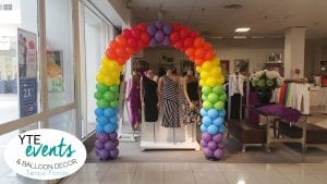 Rainbow arch balloon decor for macys mall event