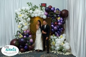 Reaction to balloon decor for wedding reception for bride and groom