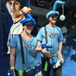 Rick and Amanda in balloon twisting gear for Tampa Bay Rays ready to twist balloon shapes for the fans at a baseball game