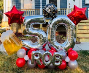 Rob turns 50 balloon decor yard display marquee with beer red stars