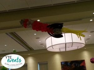 Rocket balloon sculpture for alien theme prom or homecoming