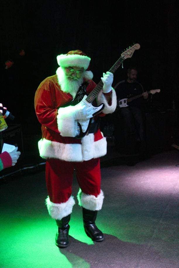 Santa Plays Guitar for Corporate Event