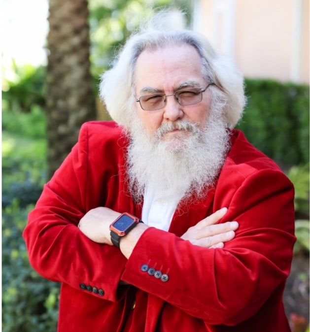 Santa in a business suit ready for an event