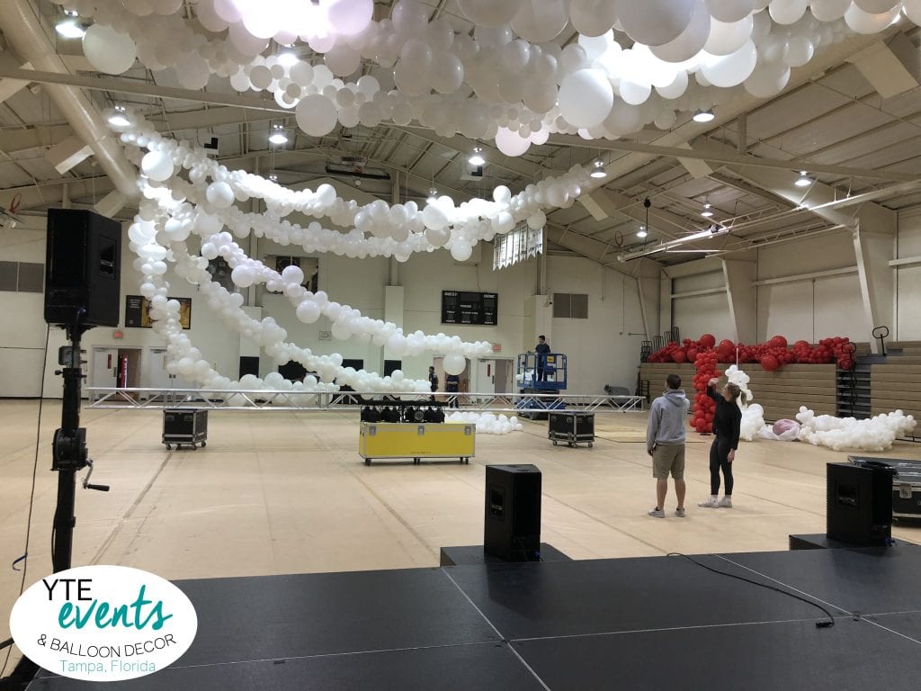 Setup before the event ceiling balloon decorations organic