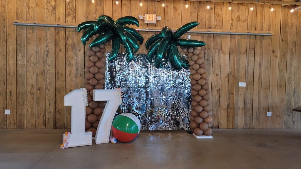 Shimmer Backdrop with balloon palm trees and 17