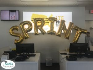 Sprint grand opening balloon figures for store in Tampa Florida giant foil letters gold