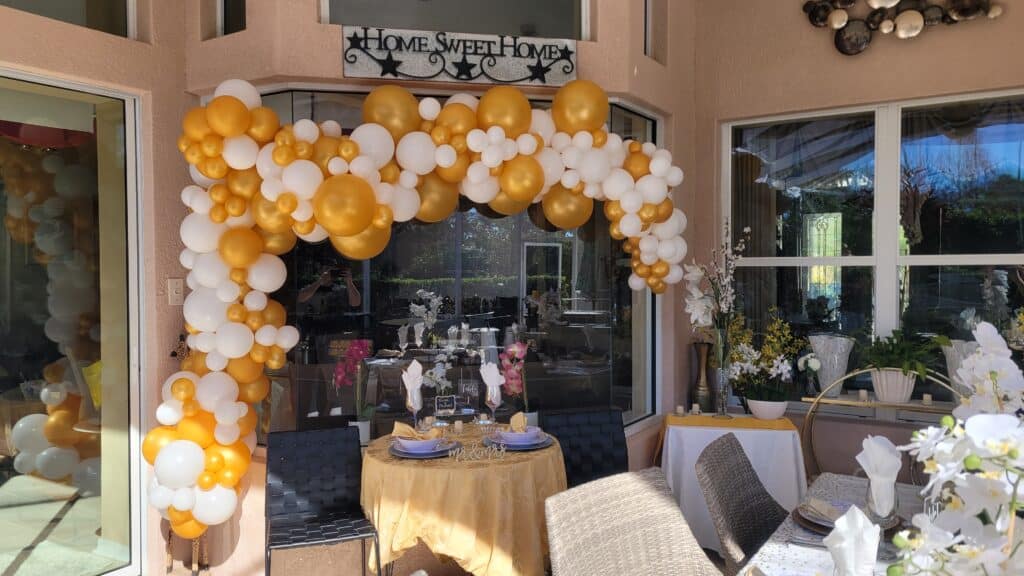 Add a touch of sophistication and style to your private home event with our White and Gold balloon organic arch. This captivating decoration sets the perfect backdrop for photo opportunities and creates an atmosphere of elegance and grandeur. The carefully arranged balloons create a dynamic and visually stunning display that will impress your guests. Let our balloon decor elevate your event to new heights.