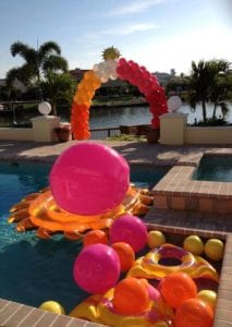 arch of floaties swimming pool celebration around Maryland Manor
