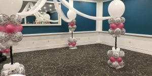 gorgeous balloon dance floor canopy with pink and white