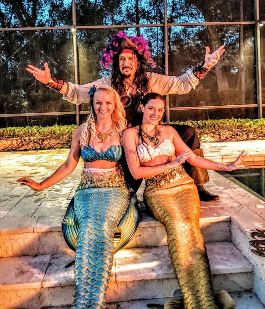 mermaids and pirate at the pool