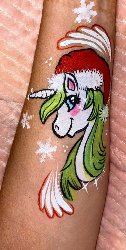 Christmas unicorn red and green with Santa hat and snowflake sparkles